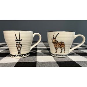 NWOT. Two World Market oryx coffee mugs.